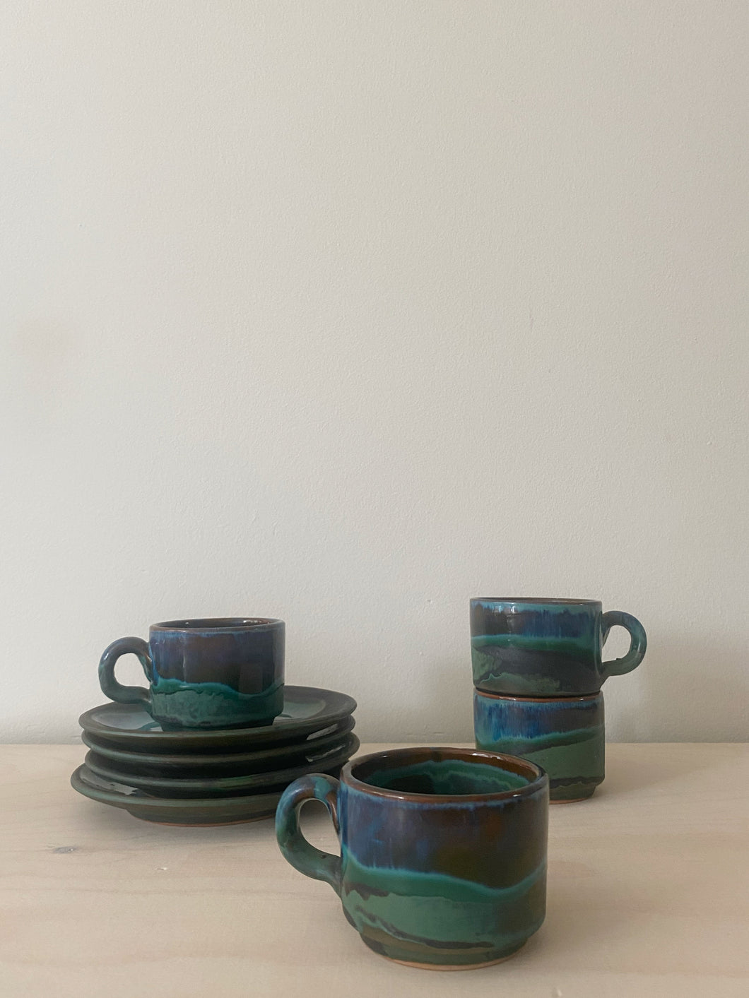 set | vier blauwe kopjes met schotel